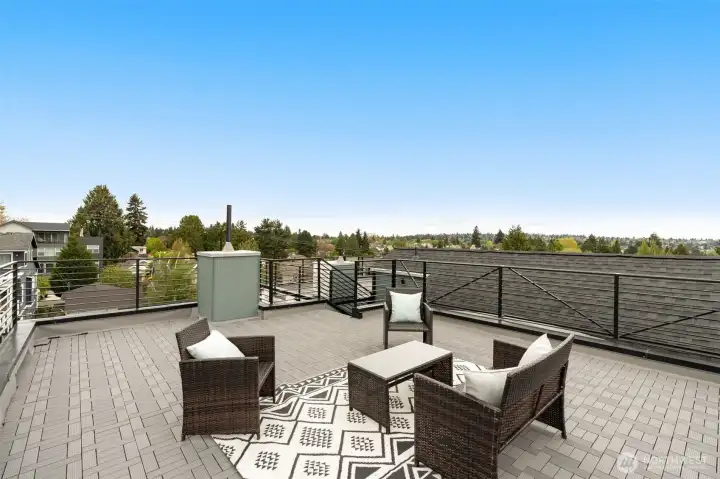 Spacious roof top deck with wonderful Cascade Mountain and territorial views