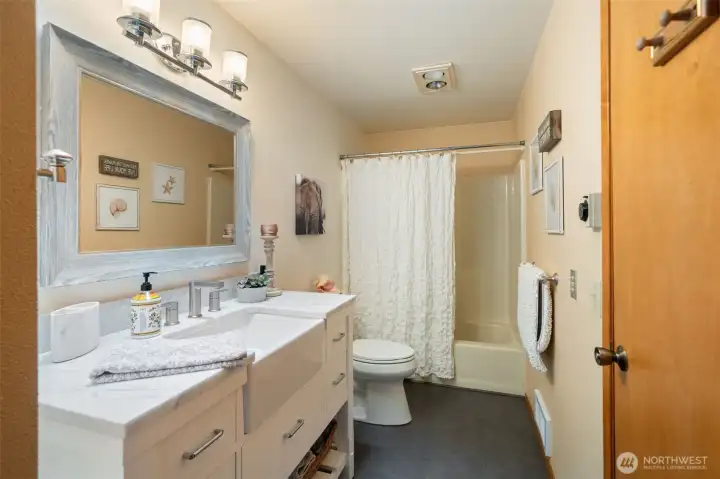 Guest bathroom on the upper level Guest bathroom on the upper level