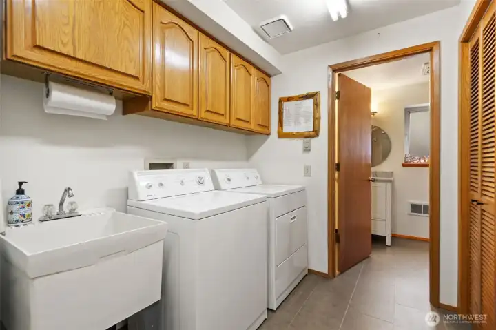 Utility Room located on the lower level. IT HAS A LAUNDRY SHOOT from the primary suite! Utility Room located on the lower level. IT HAS A LAUNDRY SHOOT from the primary suite!