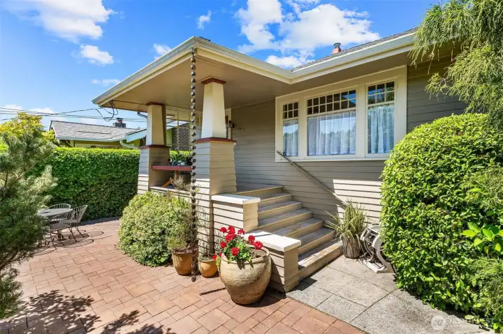 Front Exterior: A timeless Craftsman with exceptional curb appeal in the heart of Montlake, where classic Pacific Northwest charm meets a neighborhood you'll never want to leave.