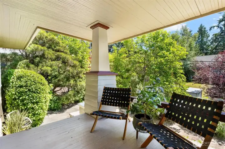 Private covered porch, perfect for relaxing outdoors.
