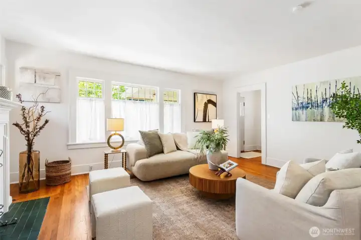 Spacious living room featuring beautiful hardwood floors.