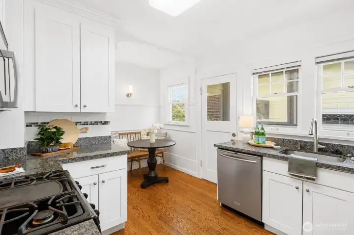 Functional kitchen featuring stainless steel appliances.