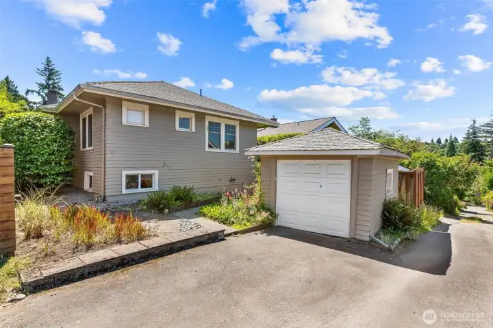 Classic detached garage ideal for vehicle storage, workshop, or additional flex space.