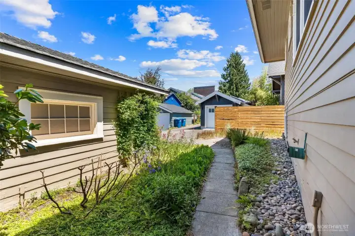 View of the alley access and detached garage.