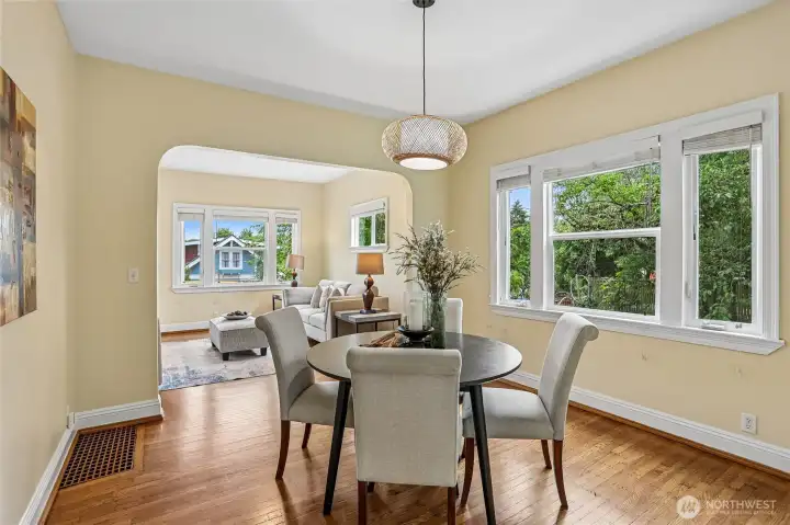 Full size dining room off of living room and leading into the kitchen.