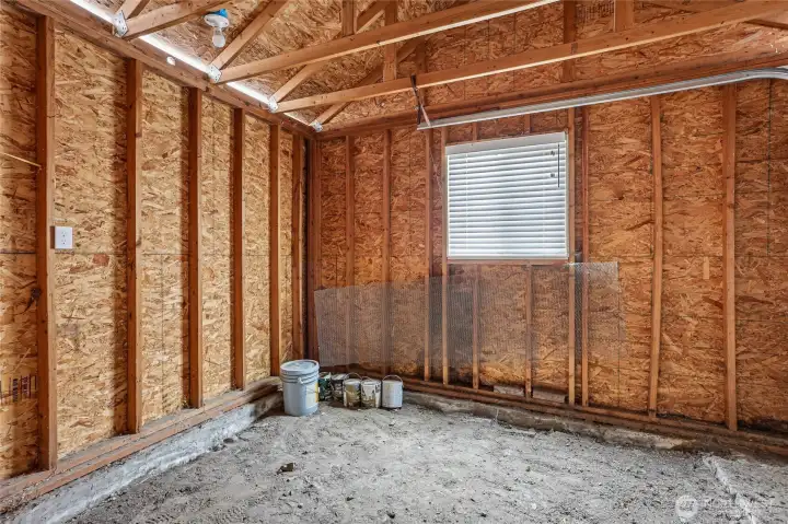 Storage area attached to the garage.