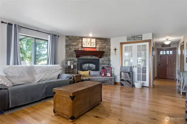 Another View of Living Room and French Doors leading you into the exercise room.