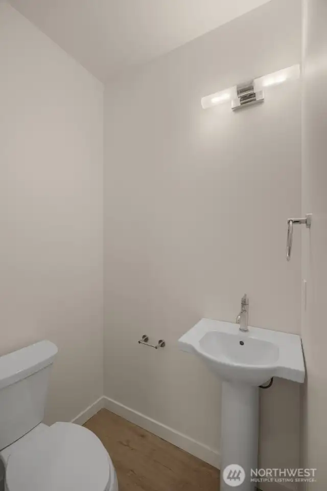 A main-floor powder room keeps things convenient for guests and makes entertaining a breeze.