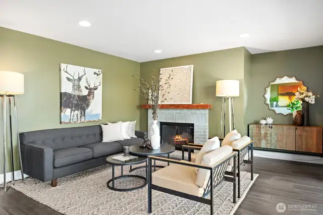 Plenty of room to add a TV in the corner.  Plus this space would accommodate an  L-shaped couch easily.
