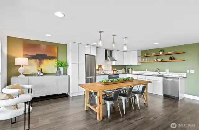 Check out this beautiful kitchen! Plenty of room for a sideboard for extra storage. Or use that space for a desk?