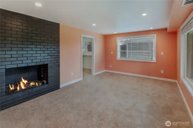 Primary suite with gas fireplace and 5 pc bath