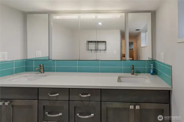 Custom vanity with slab quartz, dual sinks