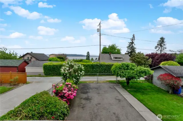 Rear yard with room for 2-4 cars and/or an RV. RV hookup included