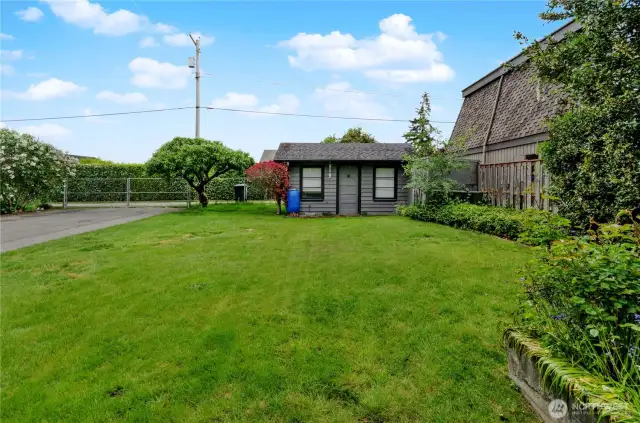 Custom built hobby shed at rear of property