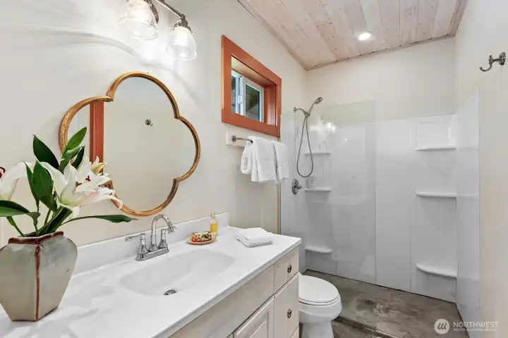 Fourth Bathroom Powder Room off of Kitchen & Living Area.