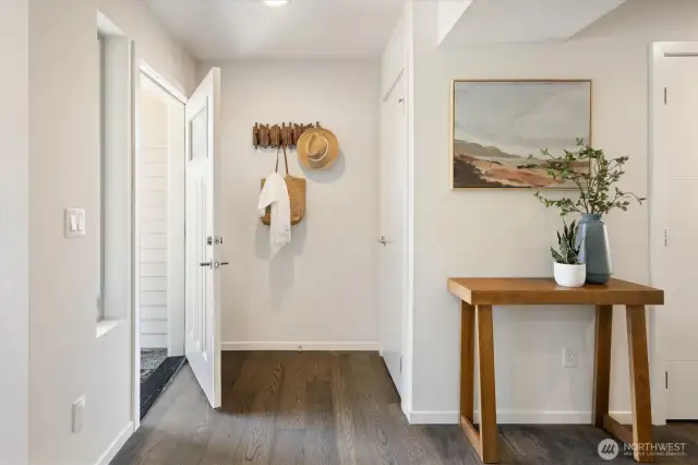 Welcoming front entry with coat closet.