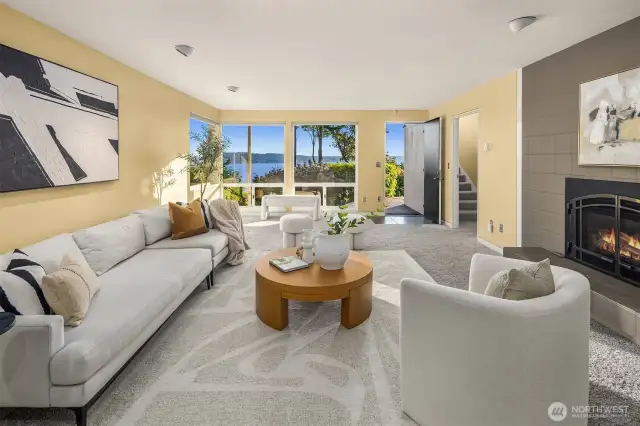 The sunny rec room opens onto the backyard, lawn, hot tub and green house.