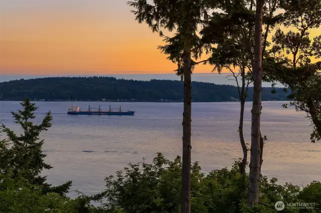 Protected views offer a year-round show of large vessels sailing along the dark blue waters of Puget Sound.