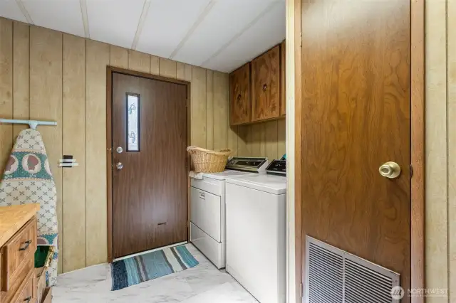 Laundry room door leading out to the back yard.