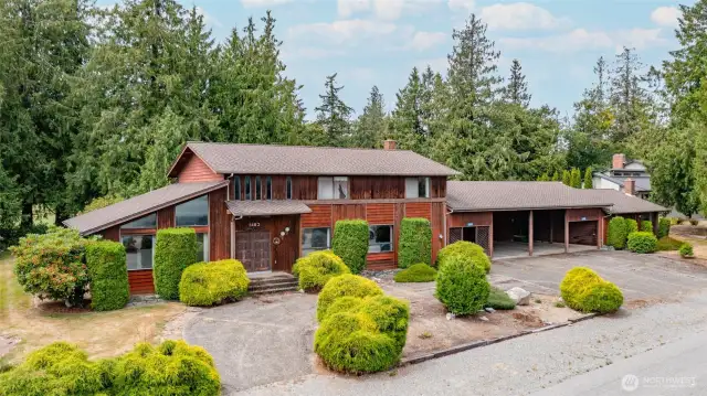 Front of the main home 12450 Eagle Drive with a view of the 1232 sqft carport