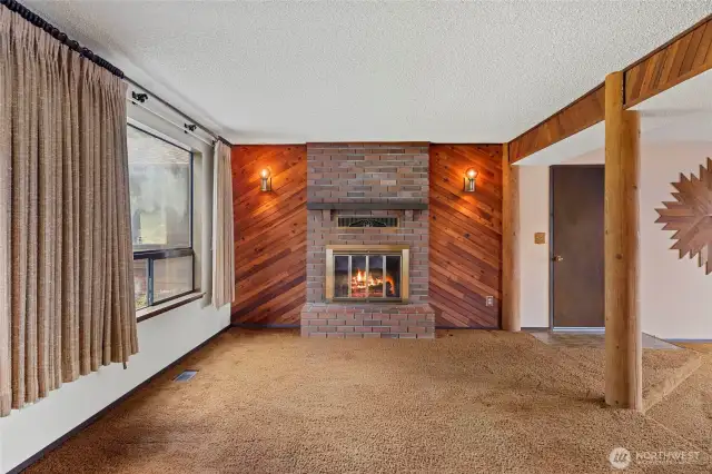 Additional view of the bonus room. The door lead to the carport