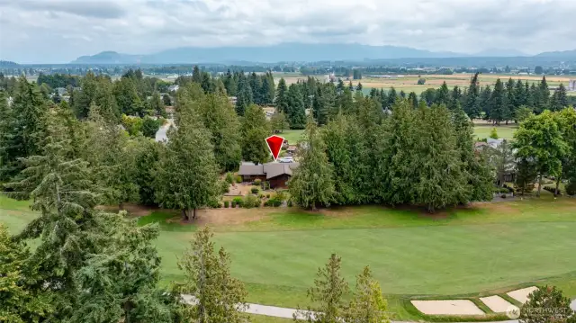 Home is located on the 2nd hole of Skagit Golf and Country Club