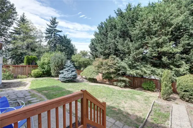 Private fenced backyard with garden space and patio.  Great entertaining space or just relaxing