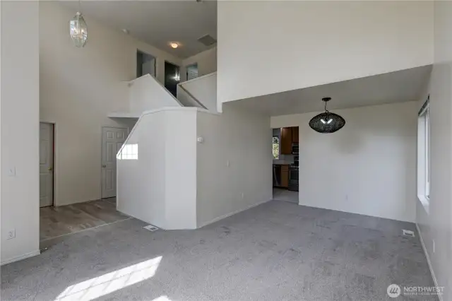 Large living room with Dining area. New carpet throughout