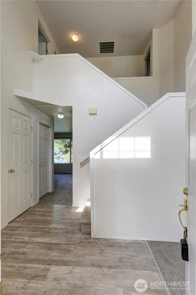 Entry with newer flooring. 1 year old