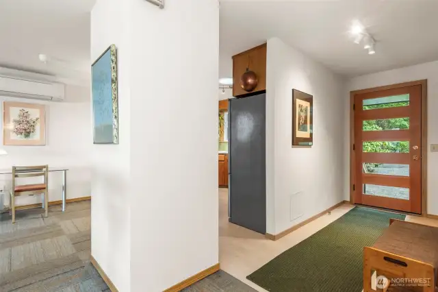View of entryway and entrance to kitchen
