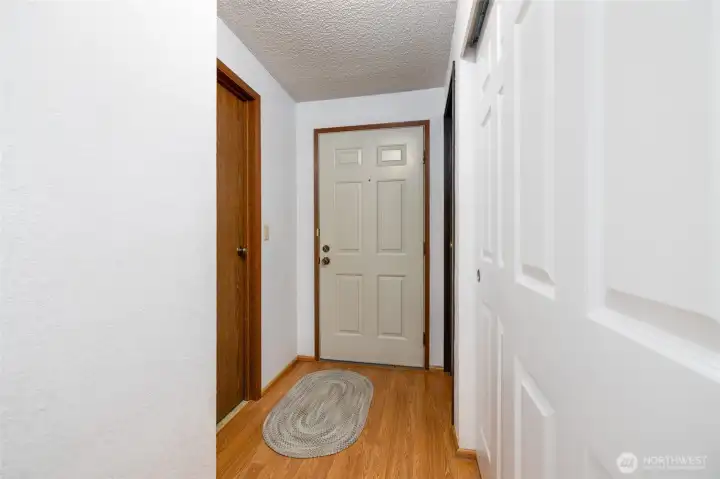 Main level feature large living room w/fireplace, open dining area, half bath with washer/dryer & direct garage access.