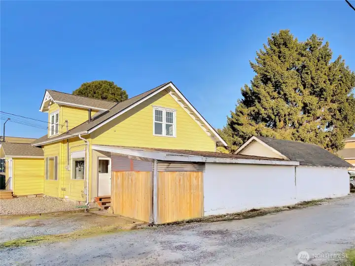 Corner of alley view of the side of workshop