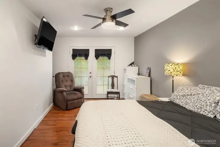 First primary has French doors to front deck