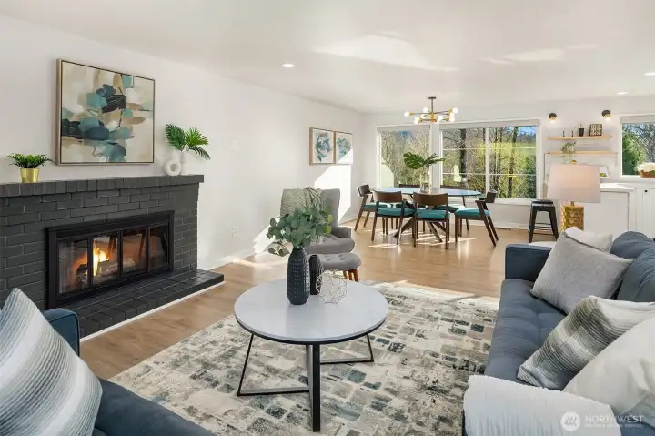 View from the living room towards the sunny dining area with view windows.