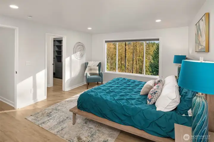 Serene views from the primary bedroom.