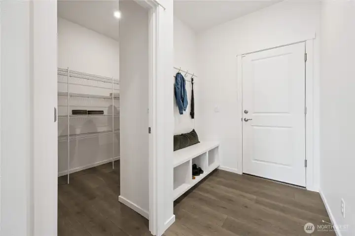 Mud-room off of garage and pantry.   Pictures are for representational purposes only, colors and features may vary.