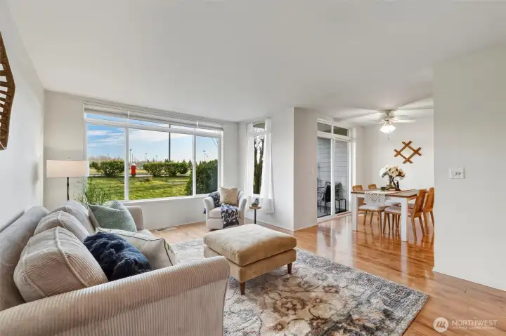 Looking across the living room toward the dining area that opens onto the cover deck.