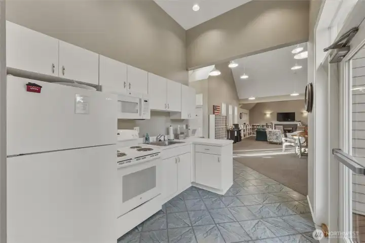The kitchen has full-size appliances.