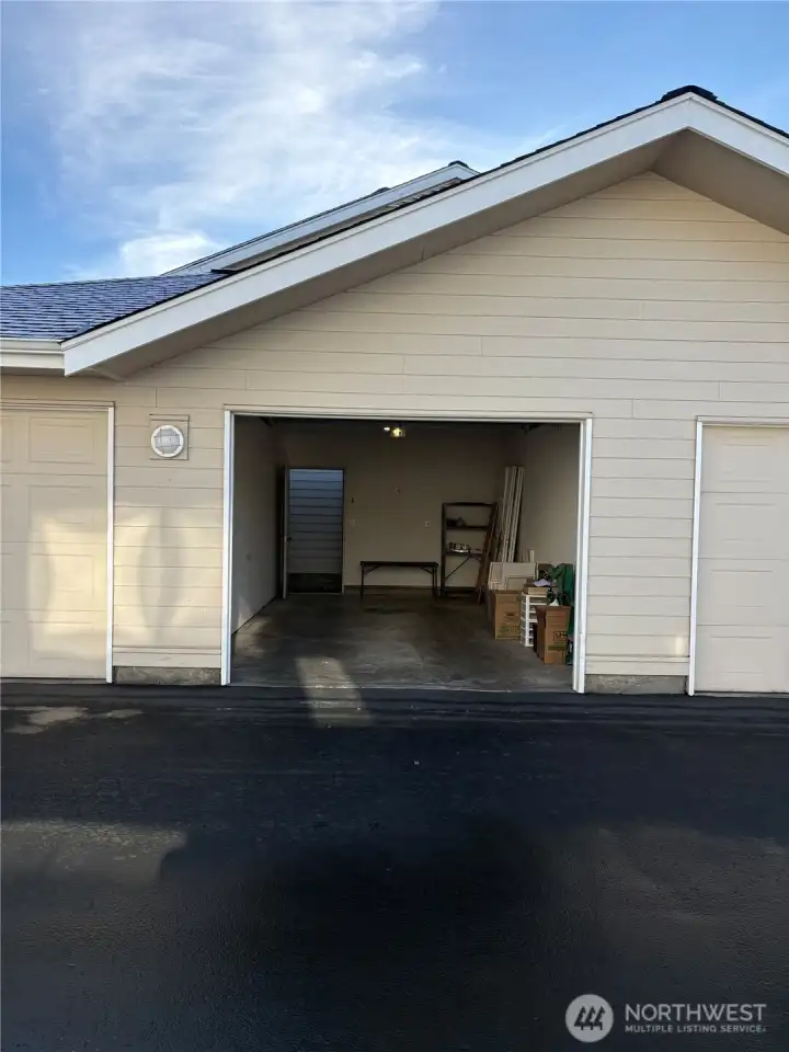 The garage is just to the east of the condo unit and has good storage space.