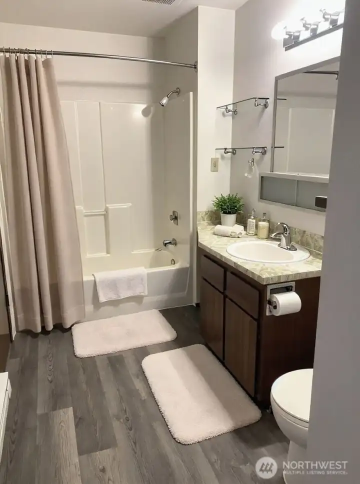 8852 bathroom with LVP flooring