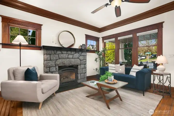Well appointed living room with the stone fireplace, freshly painted walls and the great craftsmanship.