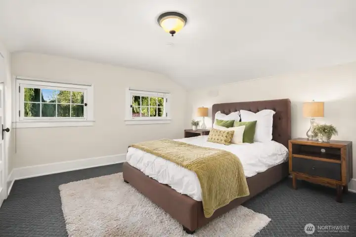 Located upstairs are 2 bedrooms and attic space which would make a great primary ensuite some day.