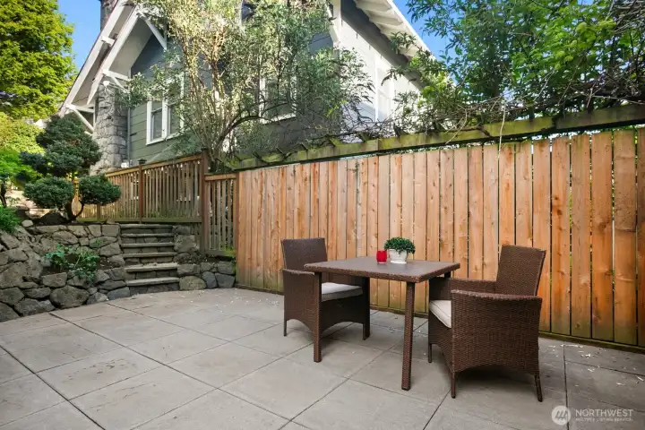 Patio that is much bigger than picture appears and there is some covered patio underneath the deck off the kitchen