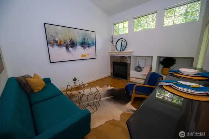 Family room with backyard access and vaulted ceilings