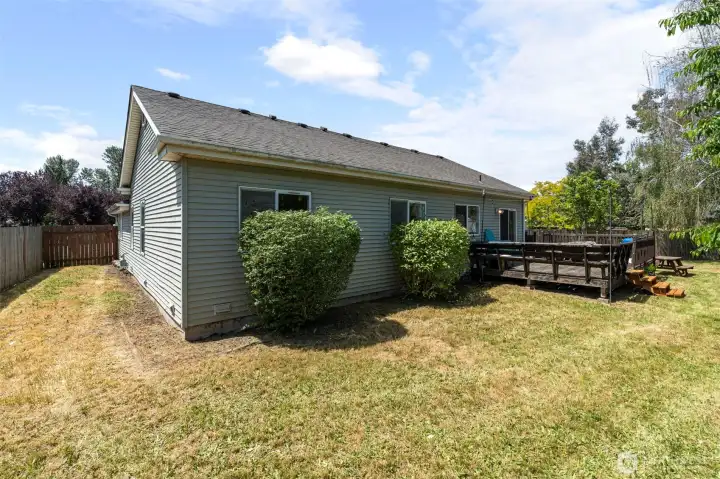 Ample space for entertaining in the fenced backyard