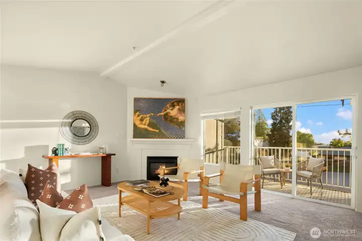 Spacious living area with private balcony off.