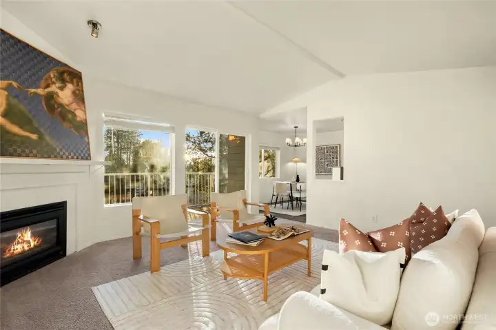 Gas fireplace. Living room off formal dining and kitchen area.