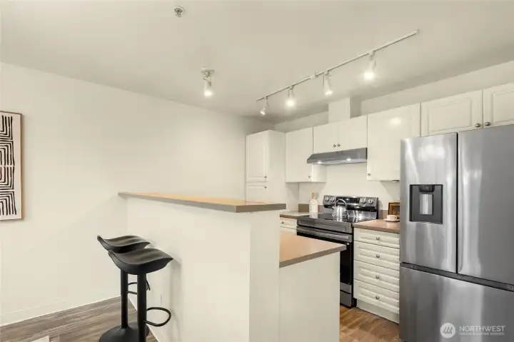 Plenty of cabinetry for all kitchen items.