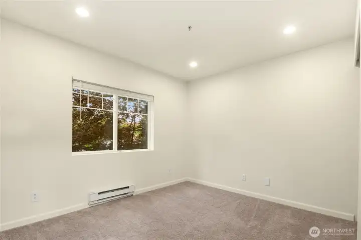 Spacious second bedroom perfect for guest room, kids room, office, or bonus space!